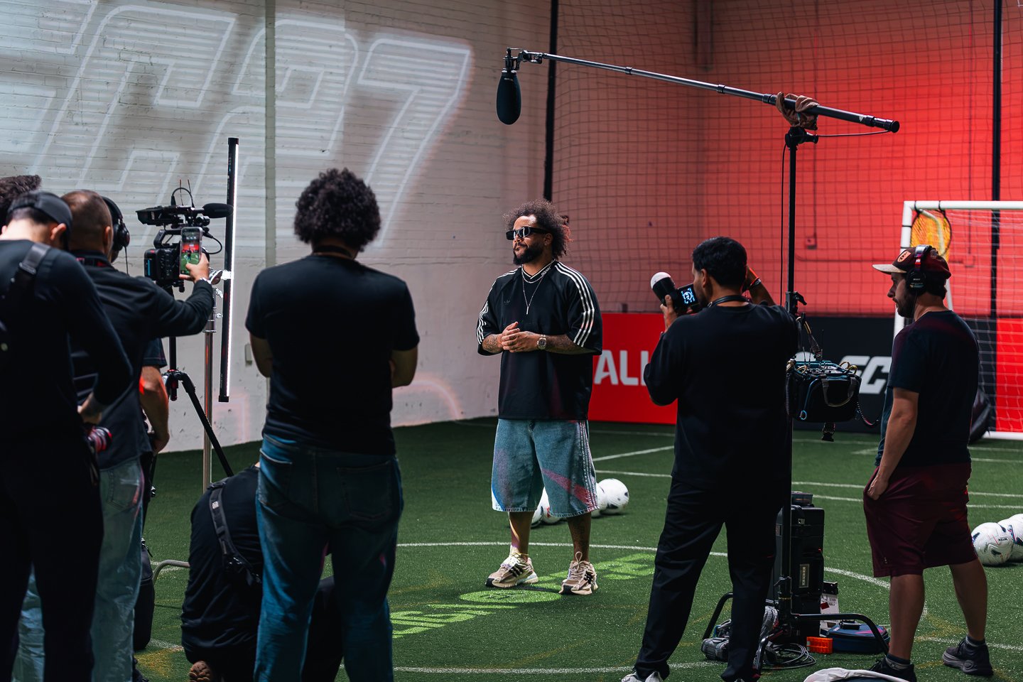 Camera crew filming on the pitch at LALIGA FC 27 Matchday in ZeroSpace, Brooklyn